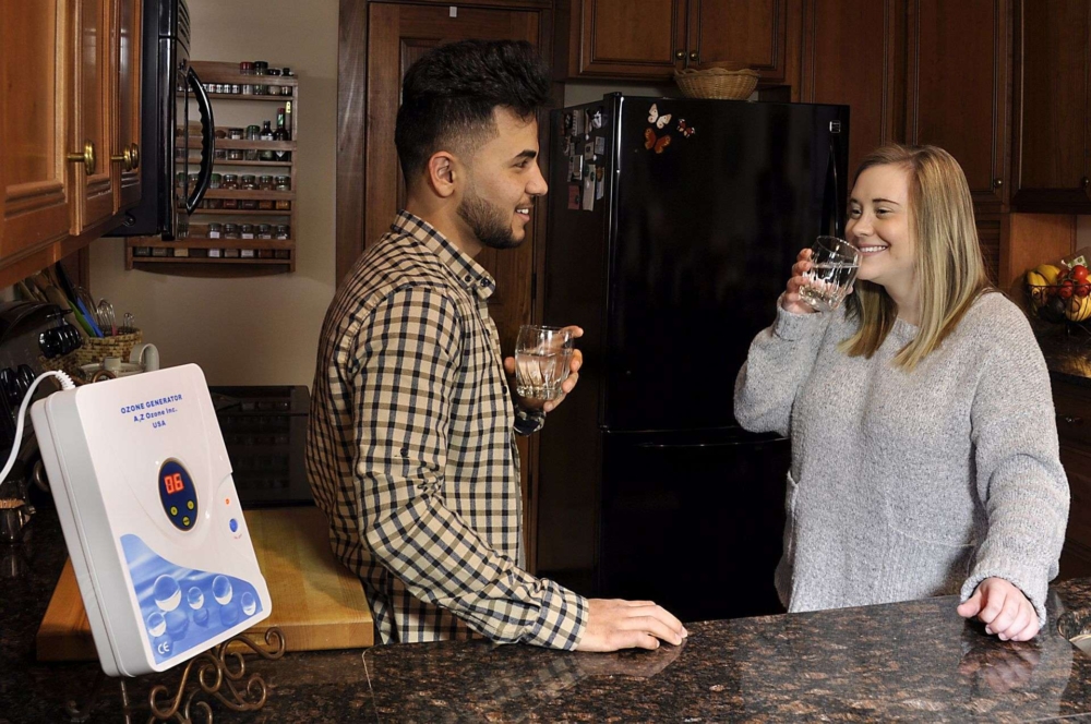 Drinking ozonated water in the kitchen